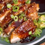 Crispy chicken thighs with a sticky teriyaki sauce